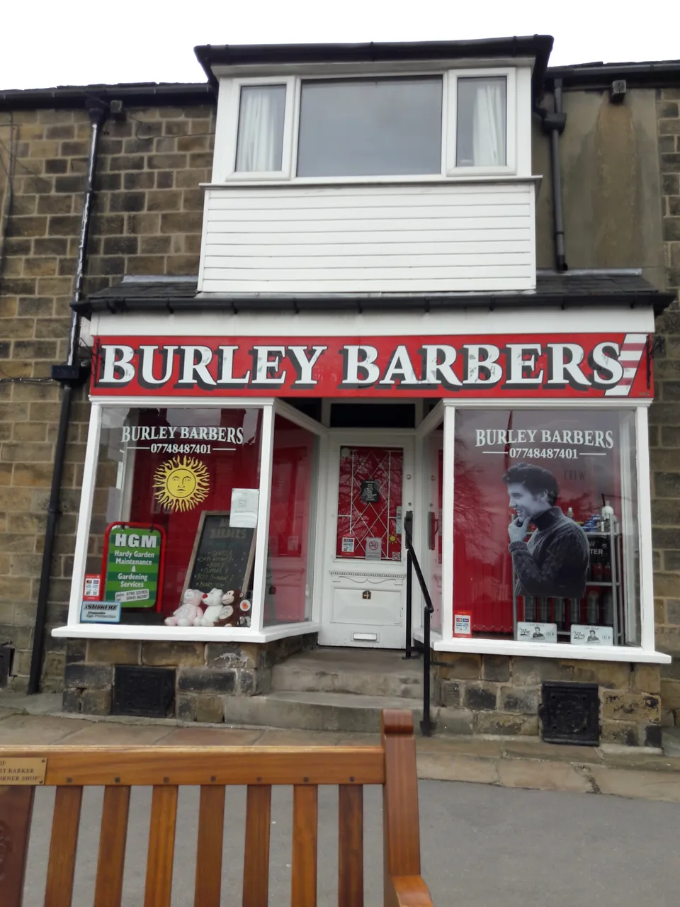 The red and white Burley Barbers shopfront at 4 Station Road
